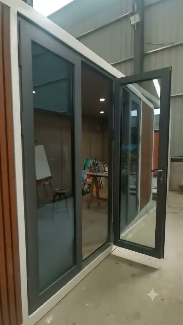 Interior walkthrough of a Domicina modular building showing wood-lined walls and kitchenette